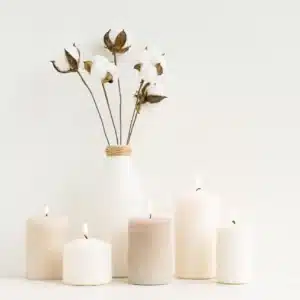 dried flowers artistically arranged with 5 candles