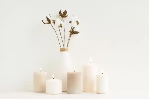 dried flowers artistically arranged with 5 candles