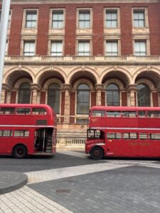 routemaster double decker busses outside victoria and albert museum