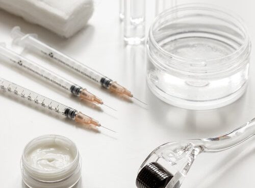 image of dermaroller and syringes for aesthetic treatments